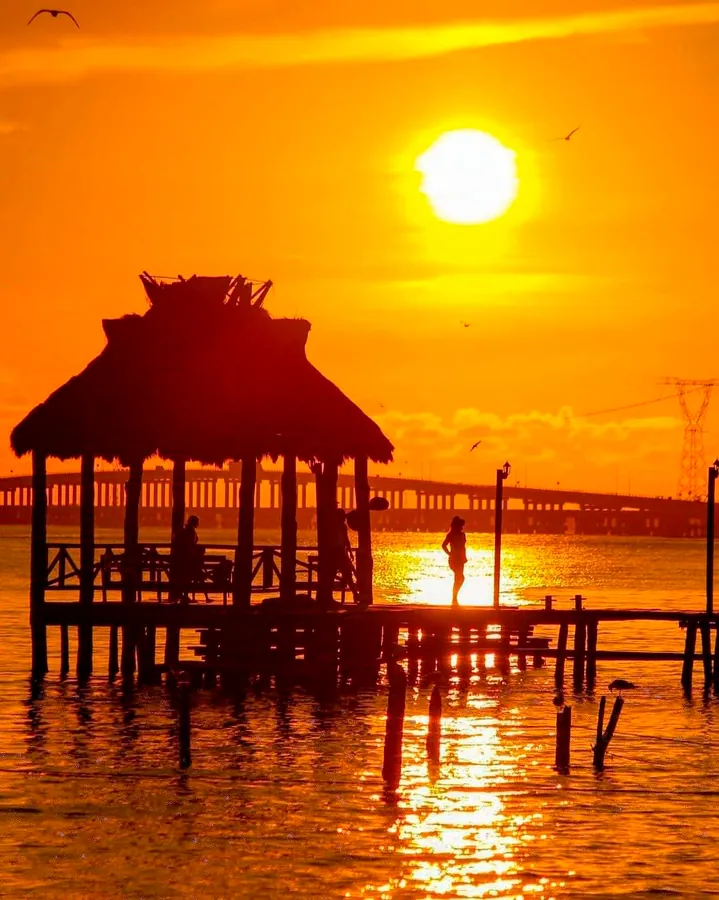 Sunset at a coastal pier